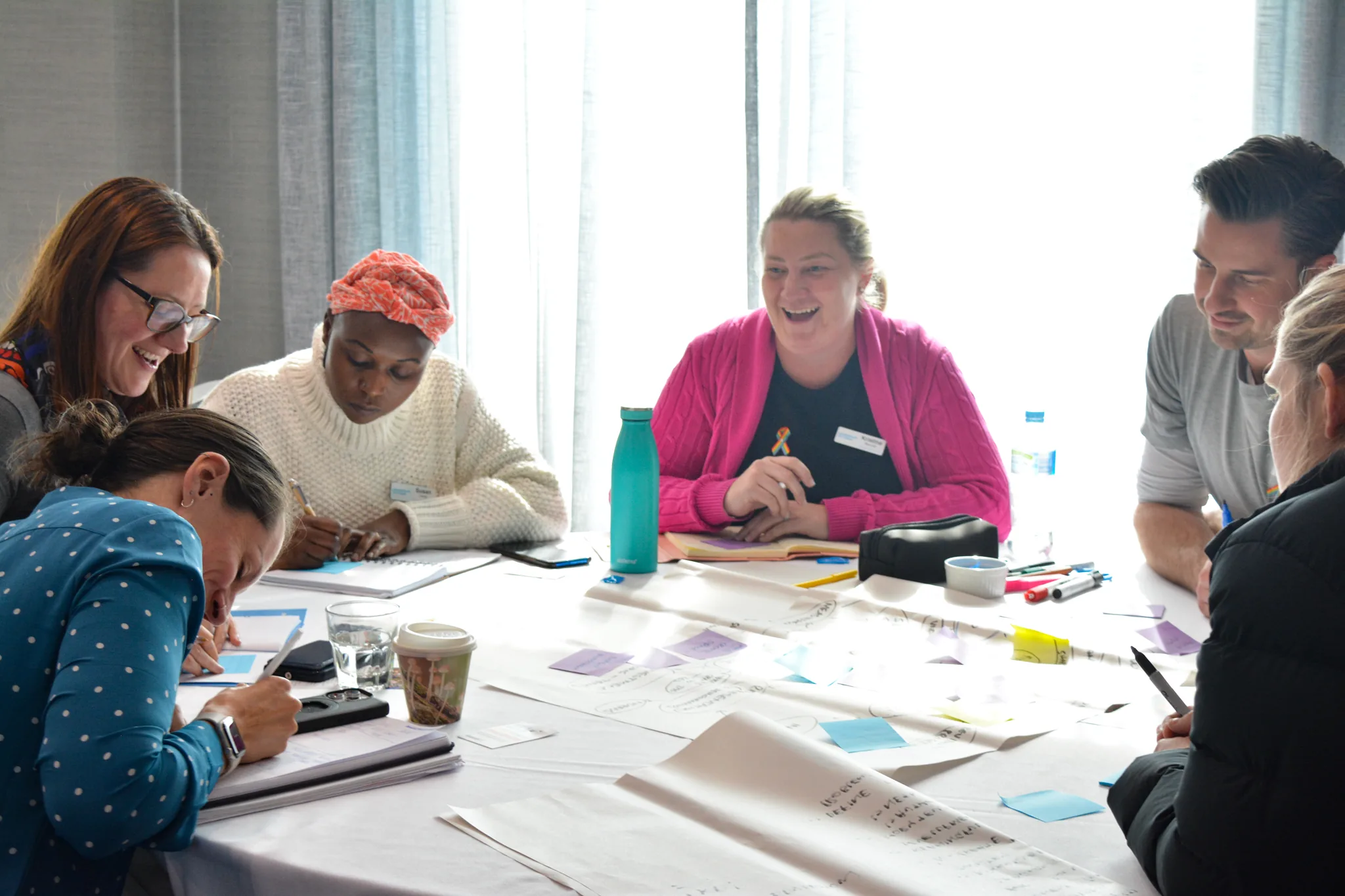 A cohort of mid-senior leaders in workshop discussion during a Leadership Victoria program